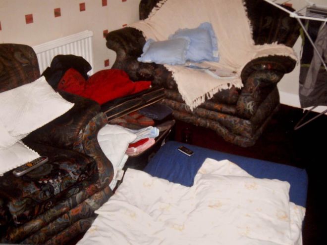 A temporary bed on a living room floor