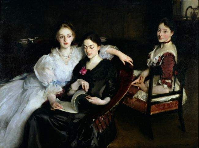 Portrait of three young women wearing nineteenth century dress by John Singer Sargent. It shows the Misses Vickers, three fashionable sisters from a wealthy family. Two of the sisters are seated together, the third on a chair close by. One wears a white gown and is staring thoughtfully away to the side as she leafs through a magazine with her companion. The third sister, looks over the back of her chair directly towards the viewer.