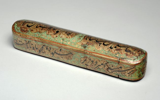 The pen case is painted green, gold and red and slides open from one end.  It has Persian calligraphic writing on it.