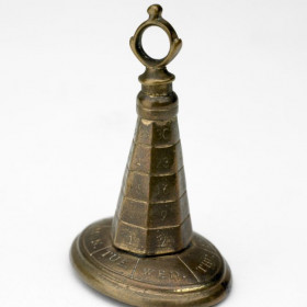 Metal Fob signet with seal: Showing calendar and days of the week.