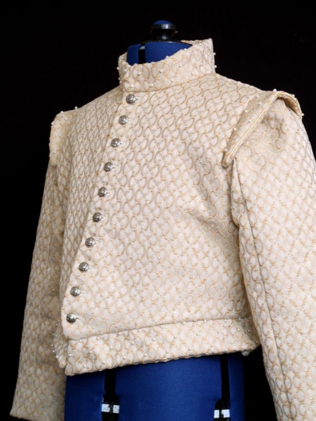 Boy's padded doublet (short jacket) , with gold brocade fabric and silver coloured buttons down front