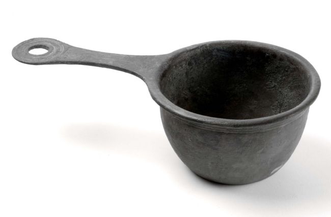 The saucepan has a large bowl and a handle that has a hole in the end, so that it can be hung from the Roman soldiers' packs.