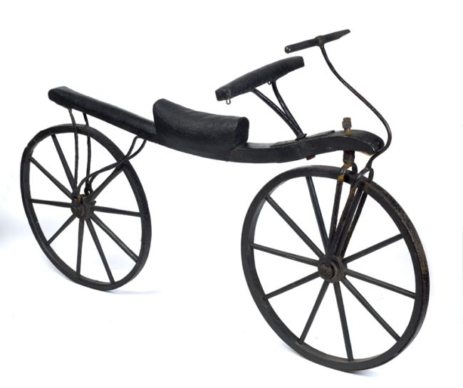 Early wooden cycle with no pedals