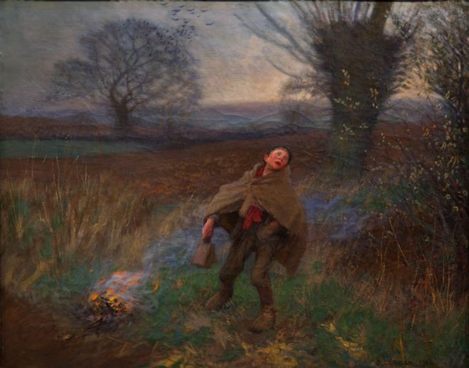 Painting by Sir George Clausen called Bridscaring of a boy scaring birds away with a wooden clapper. He has a blanket wrapped around his shoulders and is standing by a small fire.
