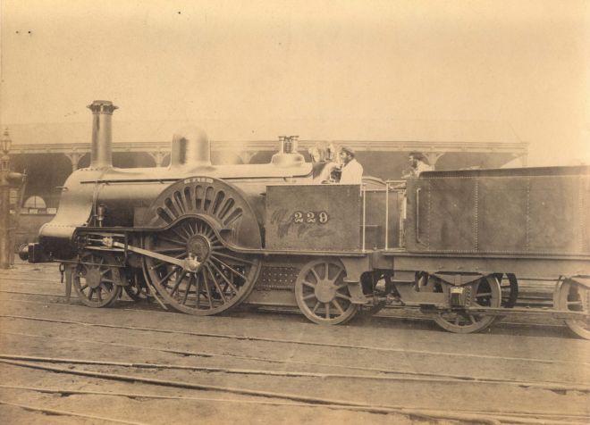 A Victorian locomotive with a steam engine.