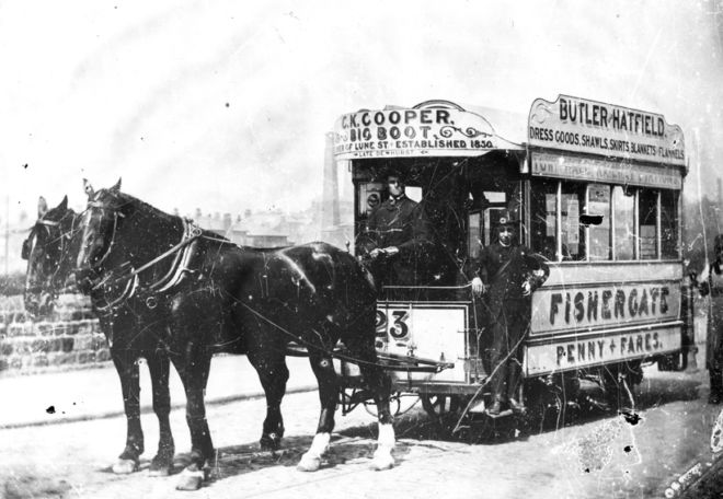 Horse drawn tram in Preston with two horses pulling it.