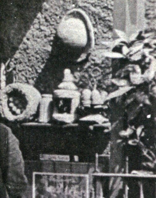 Black and white close-up showing a range of objects that look like they are made of stone