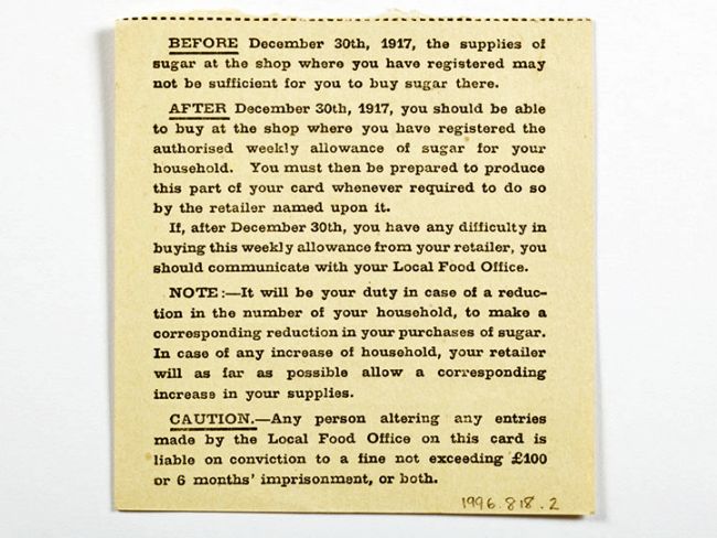 Part of the card reads "Before December 30th, 1917, the supplies of sugar at the shop where you have registered may not be sufficient for you to buy sugar there."