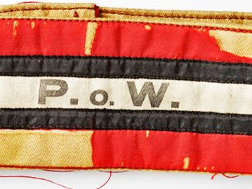 Close up of a Loyal North Lancashire Prisoners of War Help Society armband