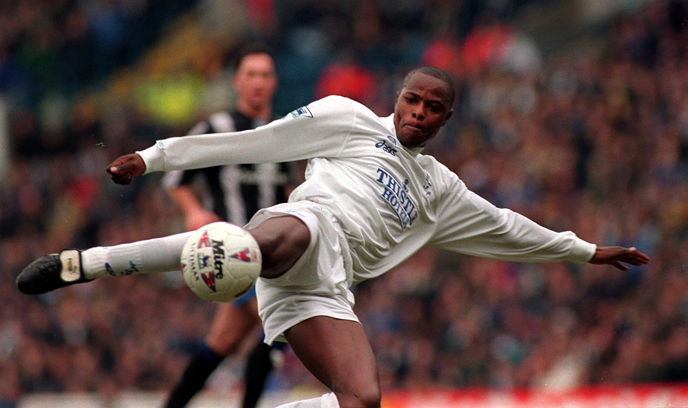 Colour photograph of Philemon in action, about to strike the ball