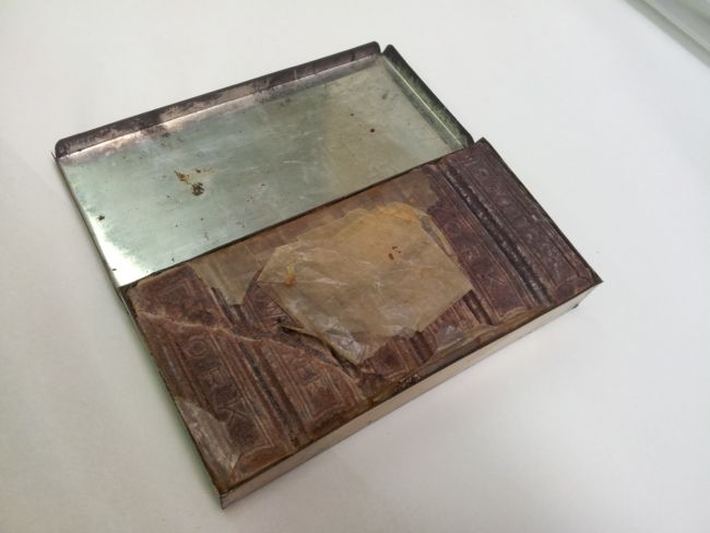 Tin filled with chocolate