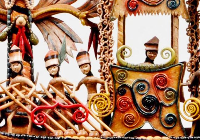 Close up showing warriors on board the boat.