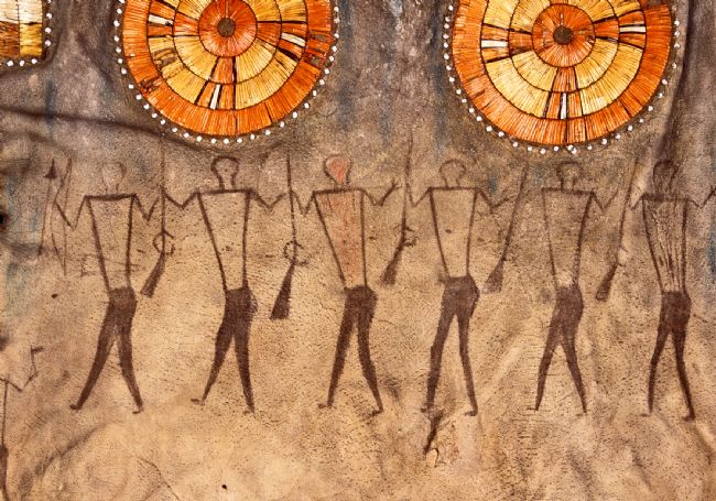 Details shows close ups of the figures on the shirt.  They are carrying either a bow and arrow or a rifle